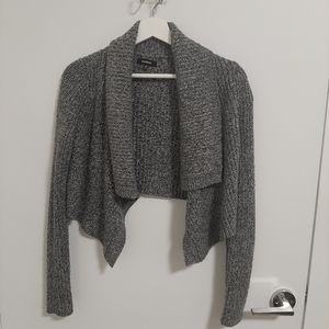 Cropped sparkly knit open sweater